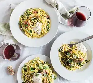 pasta and wine on table