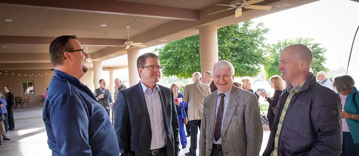 Mens ministry group outside the worship building