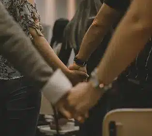 holding hands during prayer