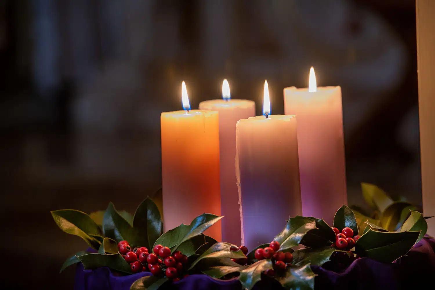 colorful candles lit in the church